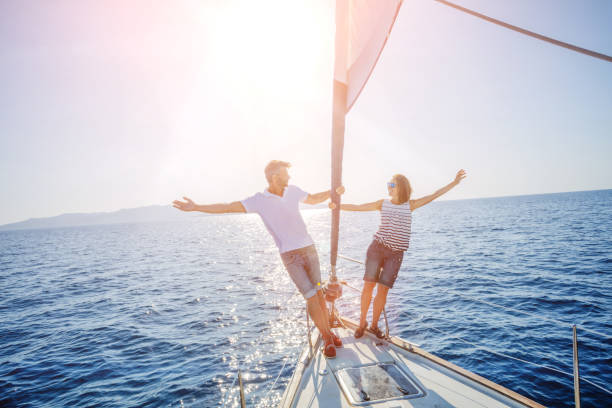 istock Young couple relaxing on the yacht 1016226450