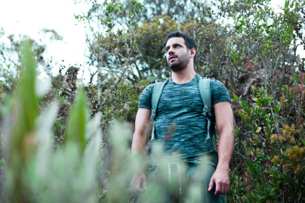 istock Man hiking in the mountain 1016226946