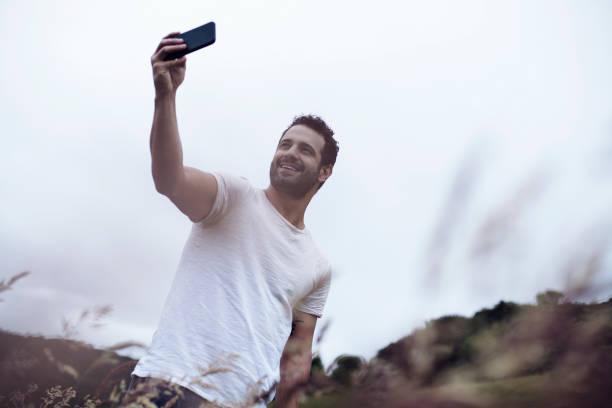 istock Man hiking in the mountain 1016229754
