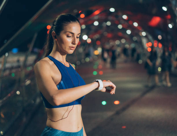 istock Sportswoman with smart watch 1016230388