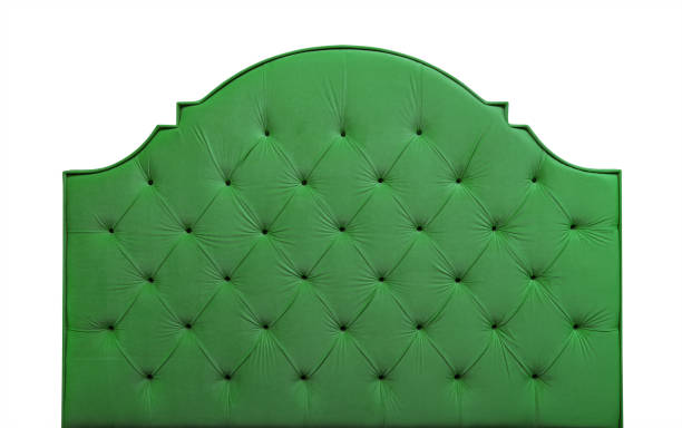 istock Green velvet bed headboard isolated on white 1016242026