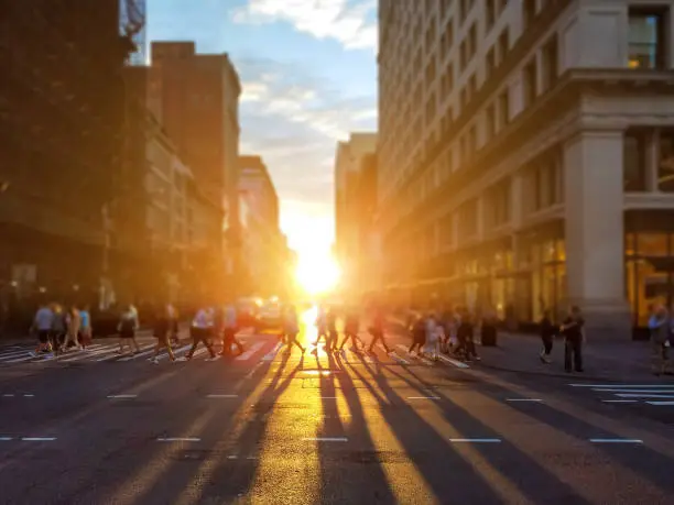 Photo of People cross busy intersection on 23rd Street in Manhattan New York City