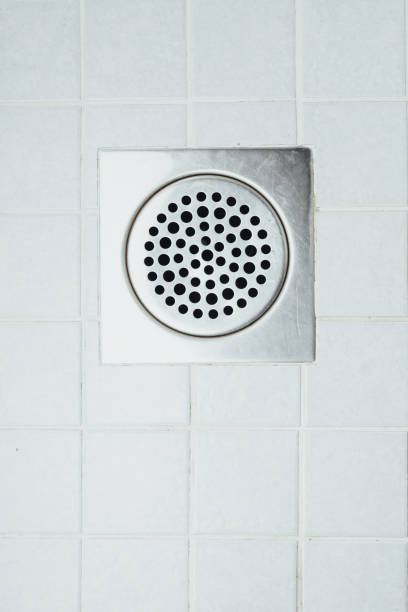 istock shower floor drain in a bathroom 1016246230