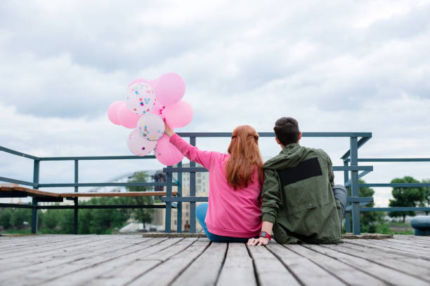 istock Pleasant young couple sitting together So beautiful 1016249472
