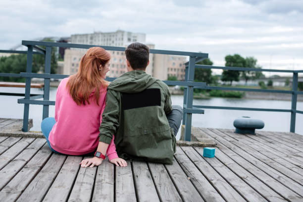 istock Joyful nice couple looking at the river 1016250756