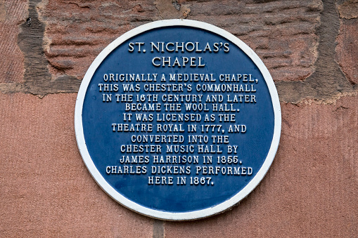 Chester, UK - July 31st 2018: A plaque at St. Nicholas's Chapel in the historic city of Chester, UK, detailing the history of the building.