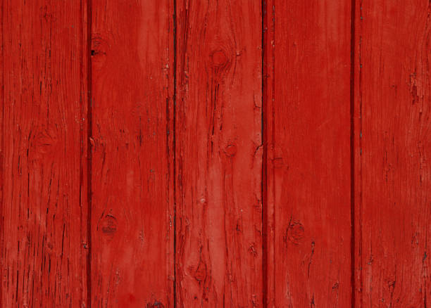 istock Red vintage painted wooden panel background 1016256104
