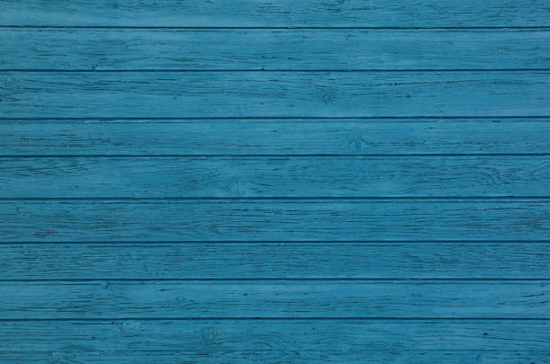 istock Blue vintage painted wooden panel background 1016256540