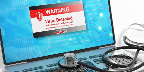 istock Virus alert on a laptop screen and a stethoscope. 3d illustration 1016257302