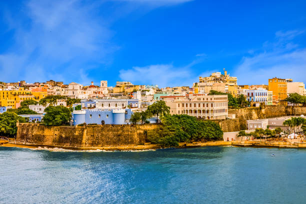 Puerto Rico on a Sunny Day Buildings on the coast of San Juan, Puerto Rico puerto rico photos stock pictures, royalty-free photos & images
