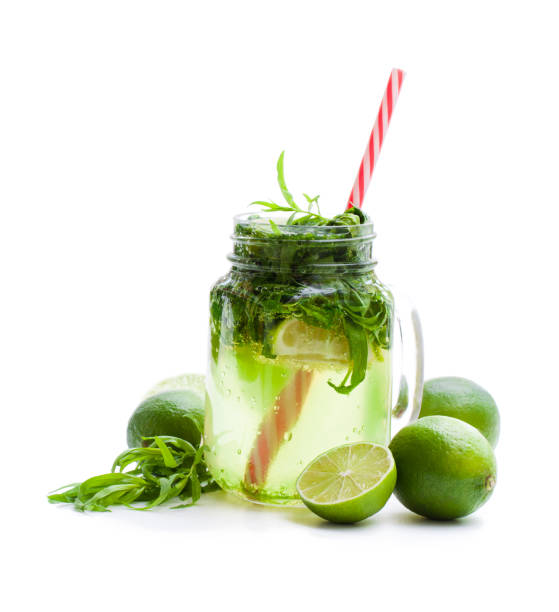istock Green  lemonade with tarragon and lime isolated on white 1016269892