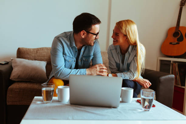 istock Happy couple relaxed at home 1016273000