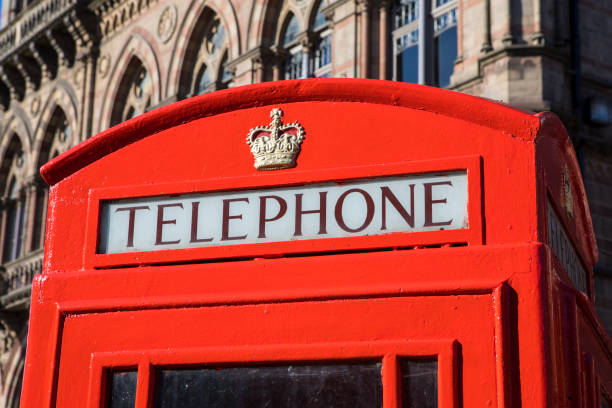 A traditional British red Telephone Box in the historic city of Chester in Cheshire, UK.