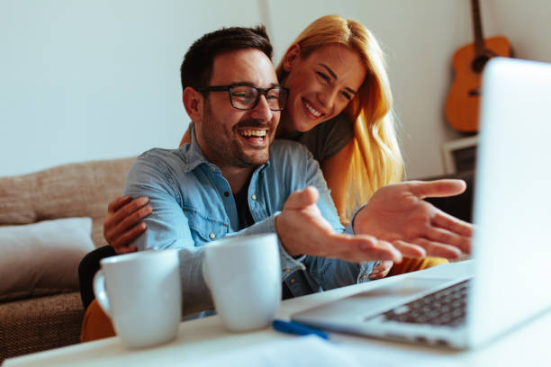 istock Happy couple relaxed at home 1016275746