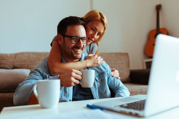istock Happy couple relaxed at home 1016275766