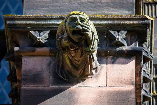 A gargoyle on the exterior of Chester Cathedral, in the historic city of Chester in Cheshire, UK.