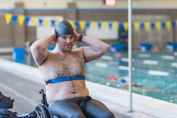 istock Adaptive athlete prepares to swim in a pool 1016281046