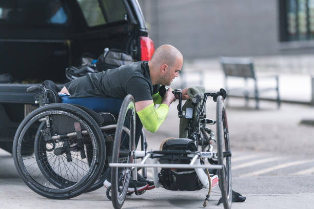 istock Adaptive athlete prepares to do a training ride on his handcycle 1016281052