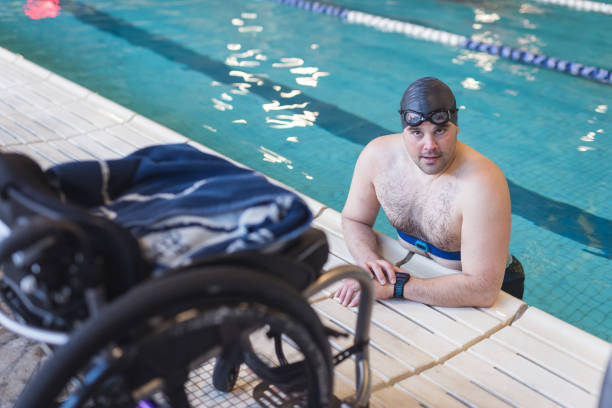 istock Adaptive athlete prepares to swim in a pool 1016281058