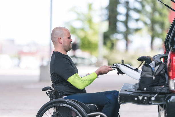 istock Adaptive athlete prepares to do a training ride on his handcycle 1016281066