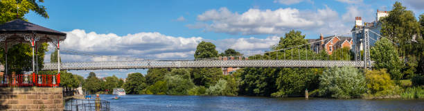 the river dee in chester, uk - chester england dee river suspension bridge bridge imagens e fotografias de stock