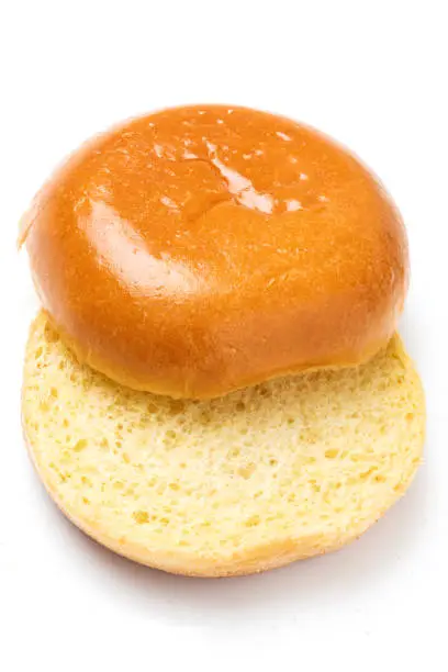 Plain hamburger bun on white background