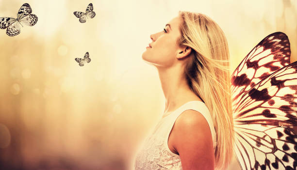 istock Beautiful young woman with butterfly wings 1016314632