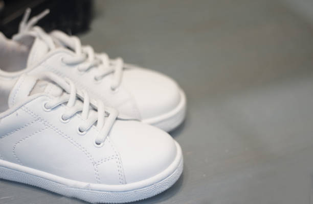 istock White generic baby sneakers. No people 1016327510