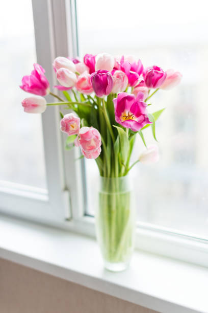 istock A bouquet of  tulips in a vase. Soft selective focus 1016341018