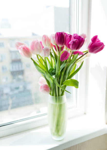 istock A bouquet of  tulips in a vase. Soft selective focus 1016341024