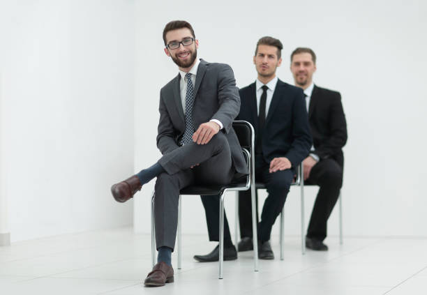 istock group of serious business people waiting for the interview 1016341564