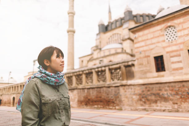 istock Young Japanese female traveller visiting mosque 1016351266