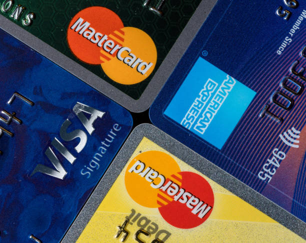 Close up of credit card issuer brands and logos MORGANTOWN, WV - 9 AUGUST 2018: Close shot of logos on credit cards from various issuers american express stock pictures, royalty-free photos & images