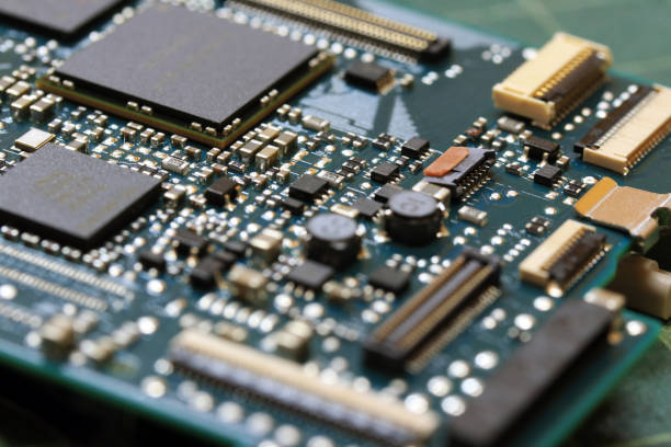 istock Electronics background technology close up of the green kit circuit board. 1016360598