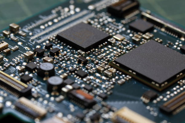istock Electronics background technology close up of the green kit circuit board. 1016360608