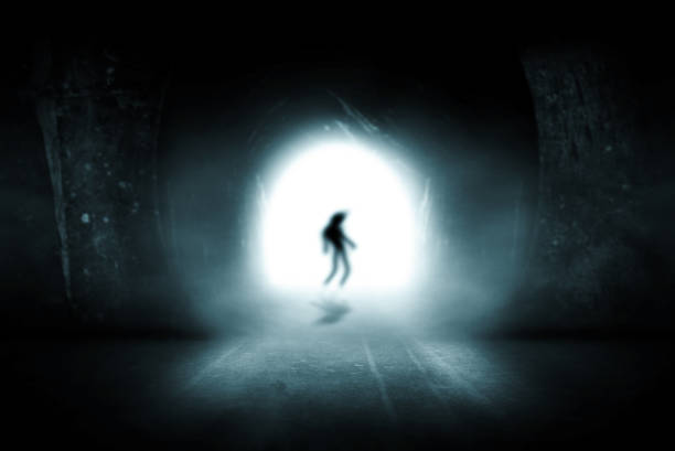 istock Shadow people in the tunnel 1016384664