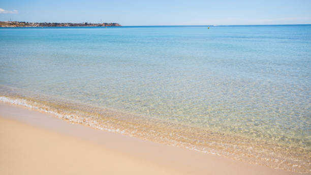 istock Calm sandy beach with clear water in Mediterranean Sea 1016384902