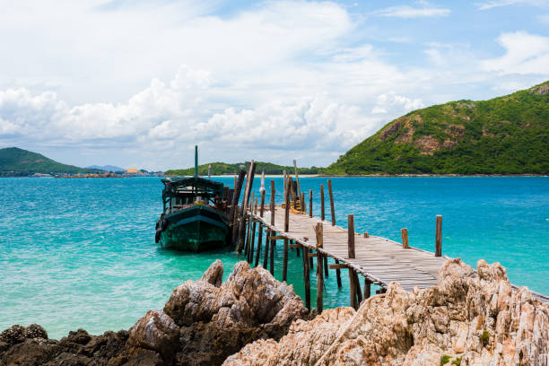 istock White sand beach with blue sea on KohKham . 1016390136
