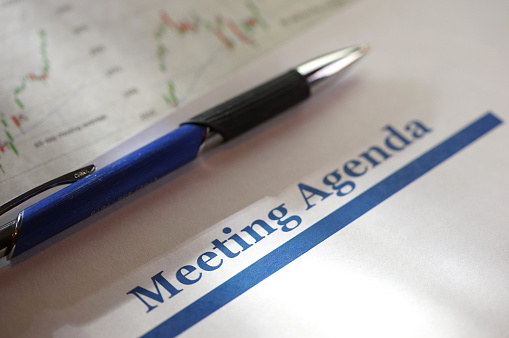 close up shot of meeting agenda