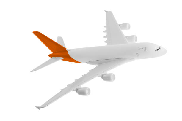 istock Airplane with orange color, Isolated on white background. 1016410740