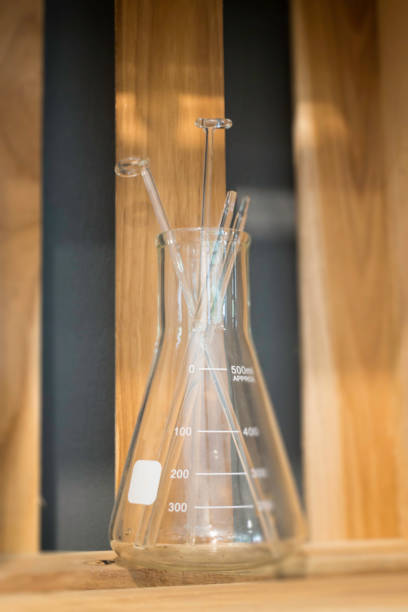 istock Decorative tube bottles on wooden shelf 1016419248