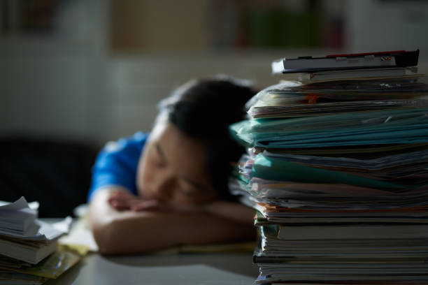 istock Asian girl studying hard 1016437094