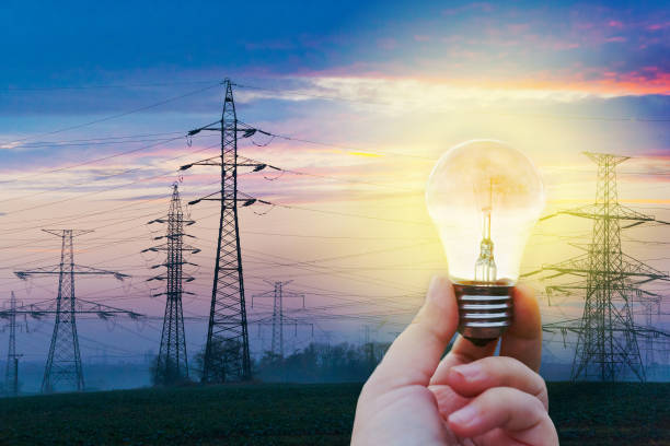 electricity - Czech energy - hand holding a bulb stock photo