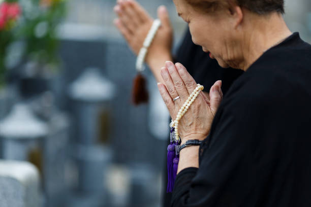 Girl praying. Side view of beautiful young blond hair woman praying at home