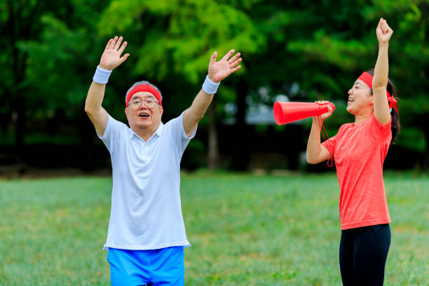 istock Young ladies cheer senior men 1016462564