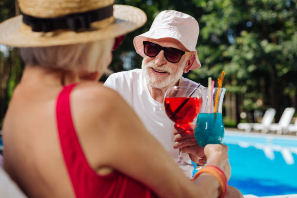 istock Loving modern grandfather holding summer cocktail 1016474476