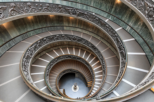 Vatican, Rome, Italy - June 7, 2018: Staircase in Vatican Museums in the Vatican City , Rome , Italy . The double helix staircase is is the famous travel destination of Vatican designed by Momo