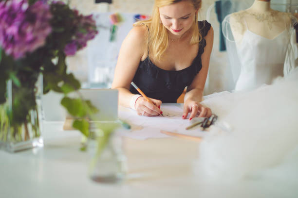istock Fashion designer is making new sketches 1016484966