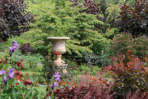 istock Ornamental urn in formal garden 1016485480