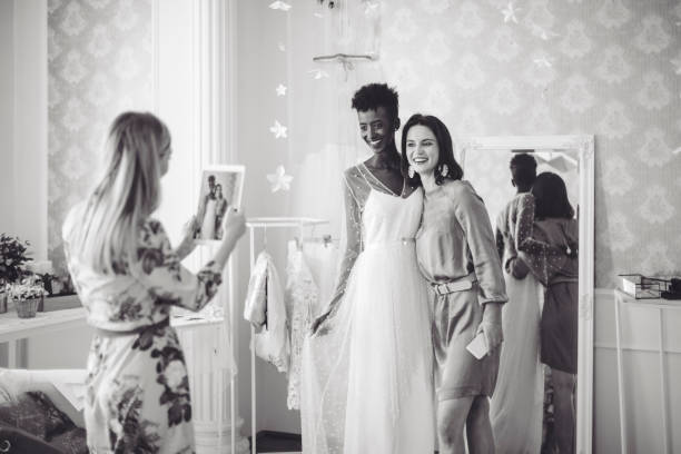 istock The bride is trying out her wedding dress 1016485572